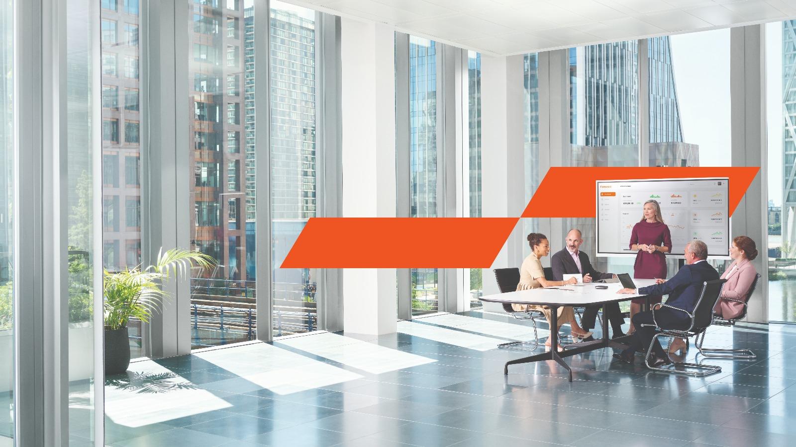 Office team discussing work at a conference table