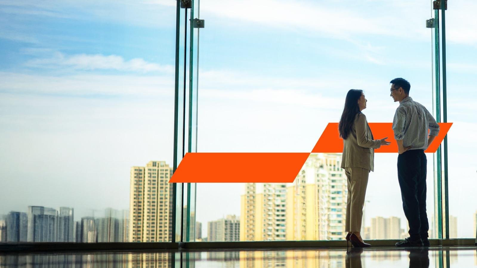 Two colleagues talking to one another