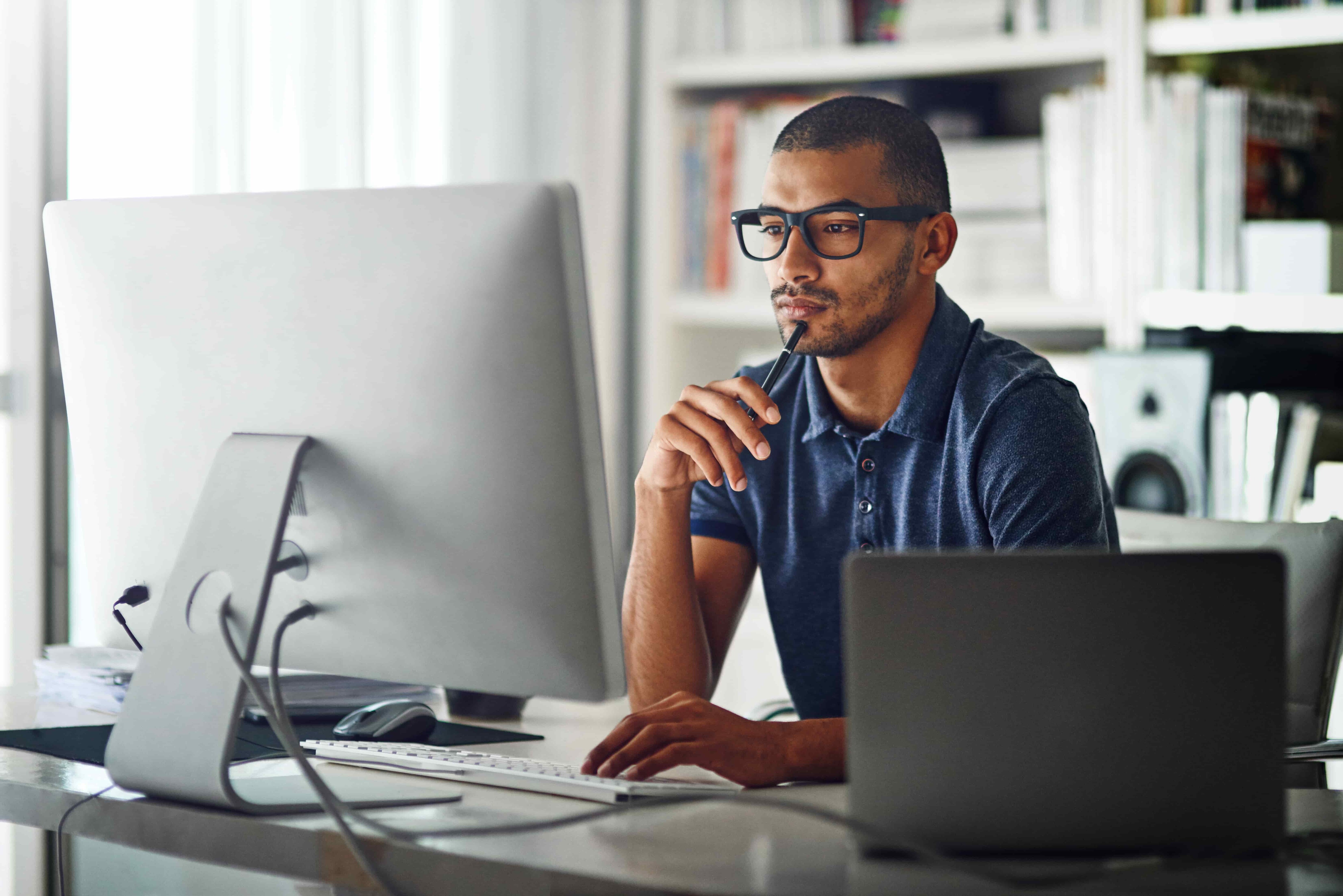 freelance coder typing javascript code on computer to... Four big problems with superannuation and how to fix them