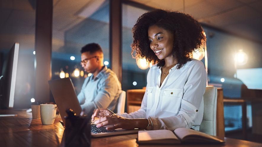 Woman looking at laptop screen